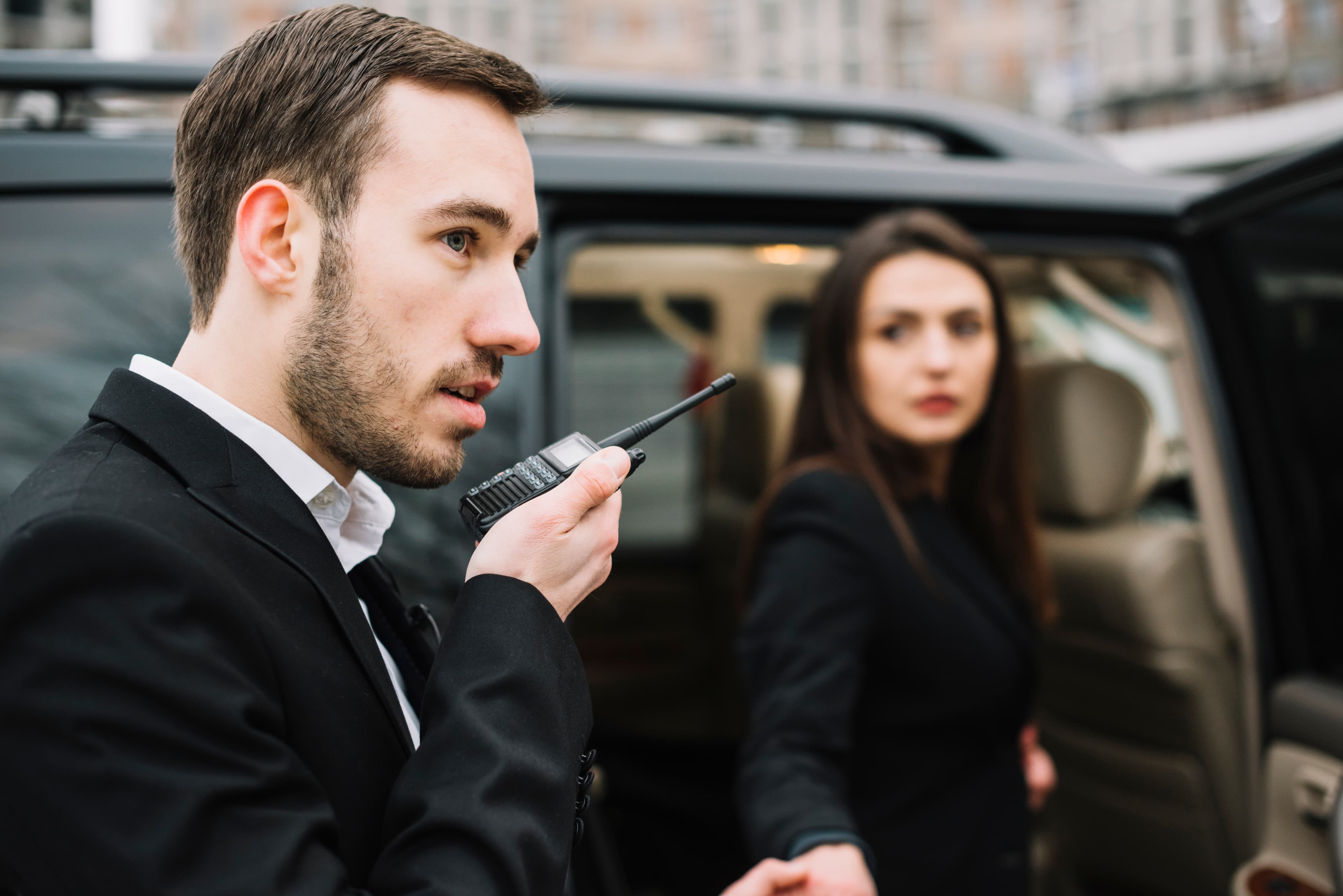 Professional security guard team in UK-style high-visibility uniform